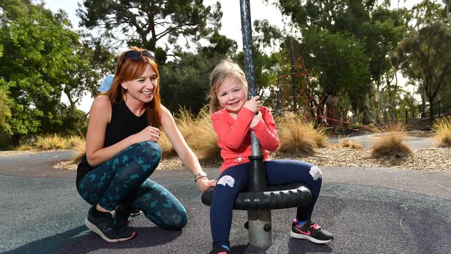 PLAYTIME:  Nicole Pirrie with Ivy - 4ys (and William - 2yrs, behind) at Kensington Gardens Reserve. Picture: Keryn Stevens