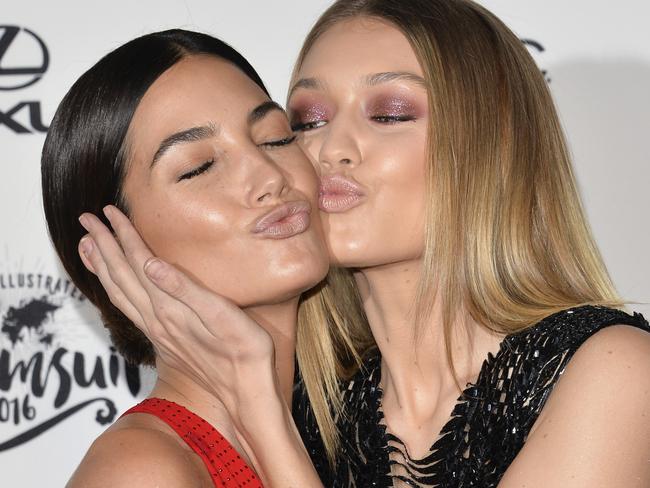 Models Lily Aldridge, left, and Gigi Hadid attend the 2016 Sports Illustrated Swimsuit Issue launch party at Brookfield Place on Tuesday, Feb, 16, 2016, in New York. (Photo by Evan Agostini/Invision/AP)