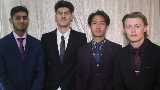 Melba College mates Milan Narayan, Nick Marshall, Michael Hrang San Lal and Jarrad McKnight at the school's Valedictory at the Karralyka Centre in Ringwood. Picture: Supplied.