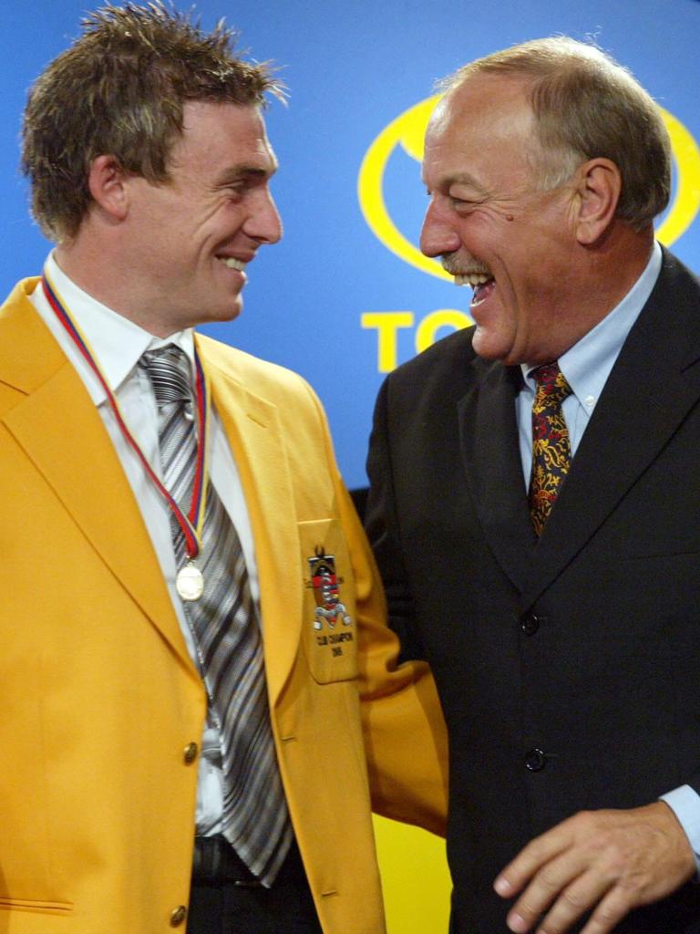 Simon Goodwin is congratulated by coach Malcolm Blight after being named the Crows’ club champion in 2005.