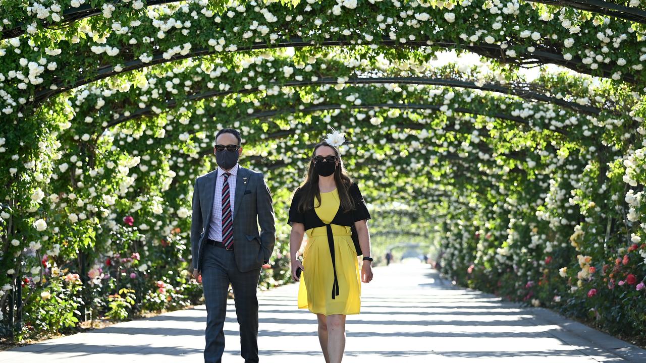 Racegoers arrive during the 2021 Melbourne Cup Day at Flemington Racecourse. Picture: Quinn Rooney/Getty Images