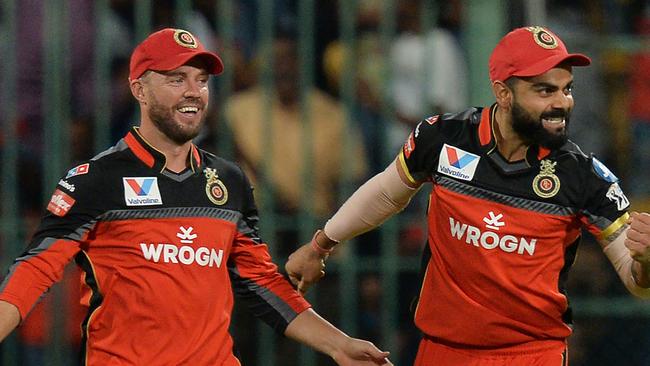 World cricket stars AB de Villiers and Virat Kohli in action for the Royal Challengers Bangalore.