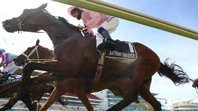 Hugh Bowman rides the ill-fated Anthony Van Dyck down the home straight on the first occasion in this year’s Melbourne Cup. Picture: Getty Images