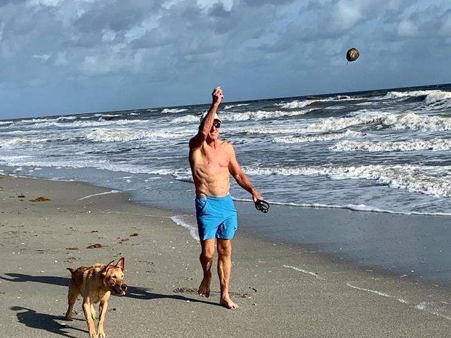 Greg Norman on Instagram, walking his dog.