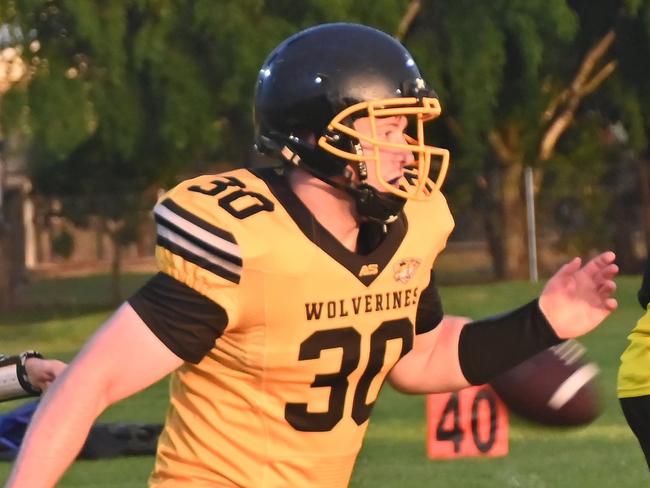 Running back Jackson Gray (number 30) has been huge for the Rockhampton Wolverines in this campaign. Photo: George Vartabedian