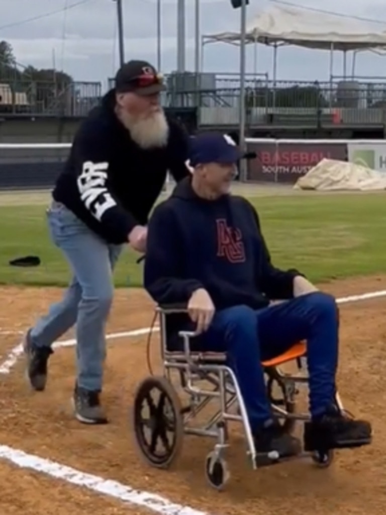 Andy Sutton is wheeled around the bases by mate Danny Hicks for a final bat. Picture: @adelaidegiants/Instagram