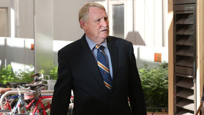 Ian Ferguson arrives at the hearing.