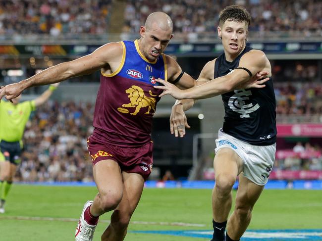 Blue Lachie Fogarty goes head-to-head with Brandon Starcevich. Picture: Russell Freeman/AFL Photos