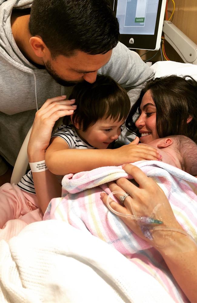 Waratahs centre Curtis Rona and wife Jacinta with newborn son Ezekiel and daughter Sapphire.