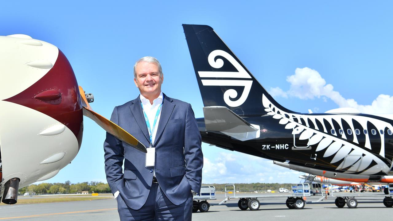 BETWEEN OLD AND NEW: Sunshine Coast Airport CEO Andrew Brodie on the tarmac at Sunshine Coast Airport to celebrate 60 years since the first landing.