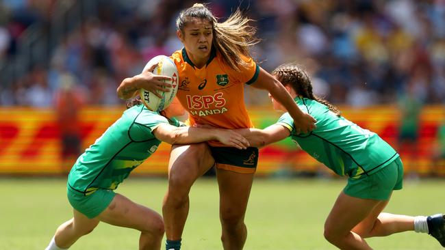 Alysia Lefau-Fakaosilea of Australia is tackled during the 2023 Sydney Sevens match between Australia and Ireland at Allianz Stadium on January 28, 2023 in Sydney, Australia. (Photo by Mark Metcalfe/Getty Images)