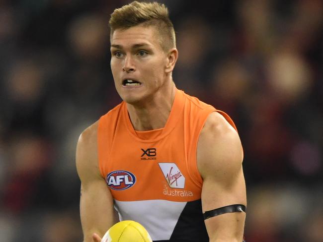 Adam Tomlinson of the Giants is seen in action during the Round 15 AFL match between the Essendon Bombers and the GWS Giants at Marvel Stadium in Melbourne, Thursday, June 27, 2019. (AAP Image/Julian Smith) NO ARCHIVING, EDITORIAL USE ONLY