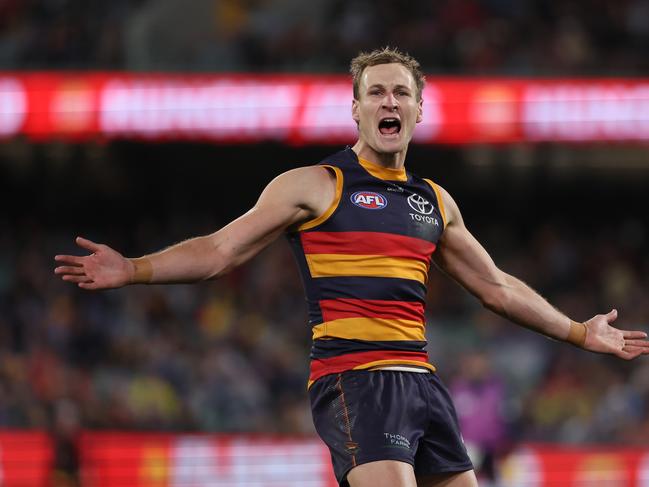 ADELAIDE, AUSTRALIA - JUNE 06: Jordan Dawson of the Crows celebrates a goal during the 2025 AFL Round 13 match between the Adelaide Crows and the Brisbane Lions at Adelaide Oval on June 6, 2025 in Adelaide, Australia. (Photo by James Elsby/AFL Photos via Getty Images)
