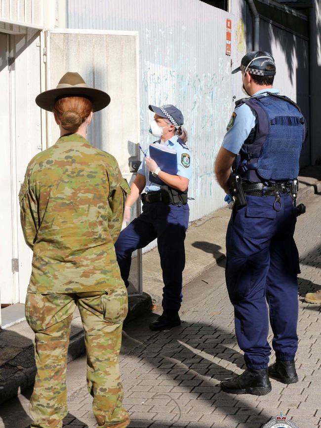 ADF officers join police in checking on people in quarantine. Picture: NSW Police.