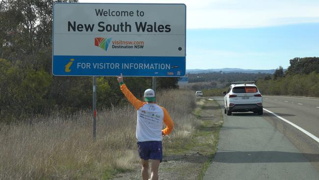 Aussie dad smashes world record, running 320km from Canberra to Sydney to raise $100K for disadvantaged kids. Picture: Supplied