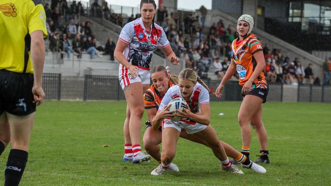 With seven teams competing, the women's tackle competition has been a huge success. Photo: Nick Friend