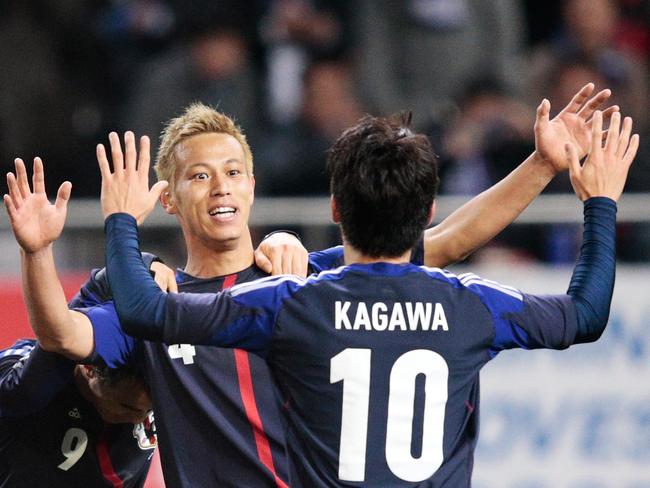 Japan stars Keisuke Honda and Shinji Kagawa.