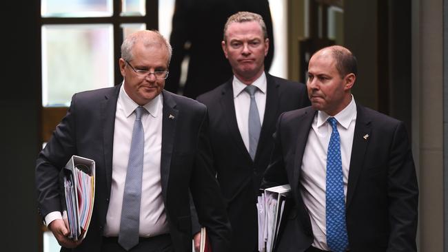 Scott Morrison, Christopher Pyne and Josh Frydenberg head into question time yesterday. Picture: AAP