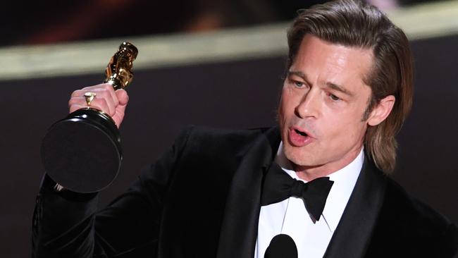 HOLLYWOOD, CALIFORNIA - FEBRUARY 09: Brad Pitt accepts the Actor in a Supporting Role award for 'Once Upon a Time...in Hollywood' onstage during the 92nd Annual Academy Awards at Dolby Theatre on February 09, 2020 in Hollywood, California. (Photo by Kevin Winter/Getty Images)