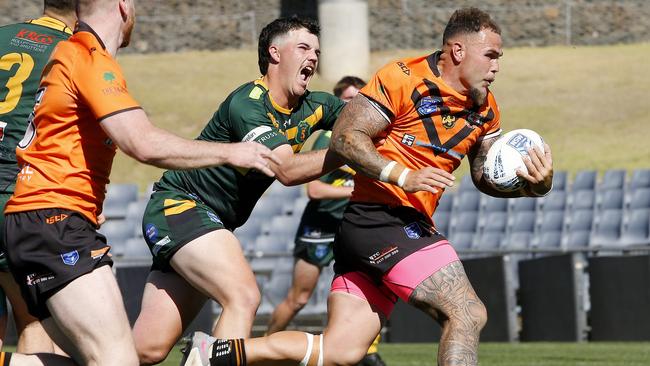 Brendon Hearne runs for the Tigers. Picture: John Appleyard