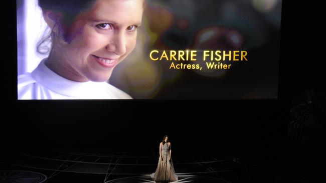 An image of the late Carrie Fisher is displayed as Sara Bareilles performs. Picture: AP