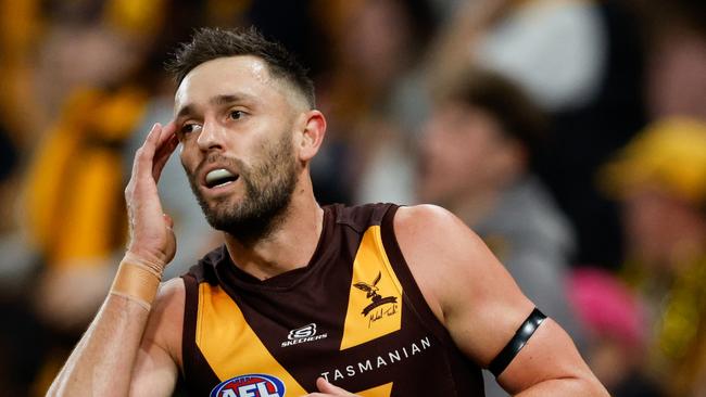 MELBOURNE, AUSTRALIA - MAY 05: Jack Gunston of the Hawks reacts to a missed shot at goal during the 2024 AFL Round 08 match between the Western Bulldogs and the Hawthorn Hawks at Marvel Stadium on May 05, 2024 in Melbourne, Australia. (Photo by Dylan Burns/AFL Photos via Getty Images)