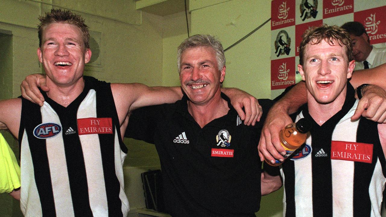 Former Pies skipper Nathan Buckley with coach Mick Malthouse and Scott Burns in 2000.