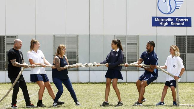 Ben Higgs from Rise Foundation, student Jamie-Lee Rooke and organiser Ashley Taylor take on student Kyiesha Booth, director of Sport Andrew Bobadilla and student Ty Koolis in a tug of war. Picture: John Appleyard