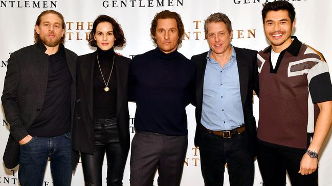 Stars of <i>The Gentlemen</i>: (from left) Charlie Hunnam, Michelle Dockery, Matthew McConaughey, Hugh Grant, and Henry Golding. Picture: Getty Images