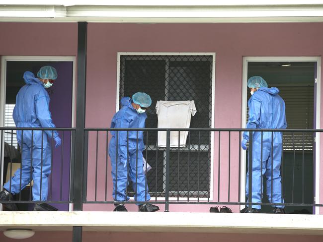 Police forensic officers investigate outside the rooms where the stabbings took place, the day after Mia Ayliffe-Chung was stabbed to death. Picture: Lyndon Mechielsen/The Australian