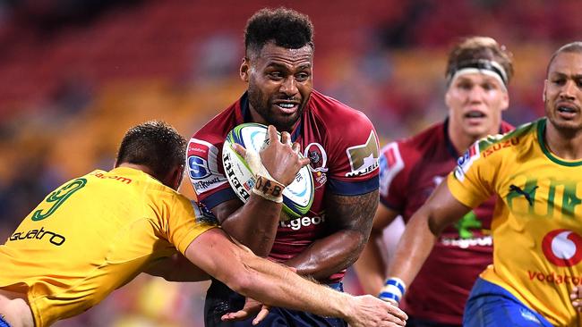 Queensland’s Samu Kerevi tries to bust through the Bulls defence on Saturday night.