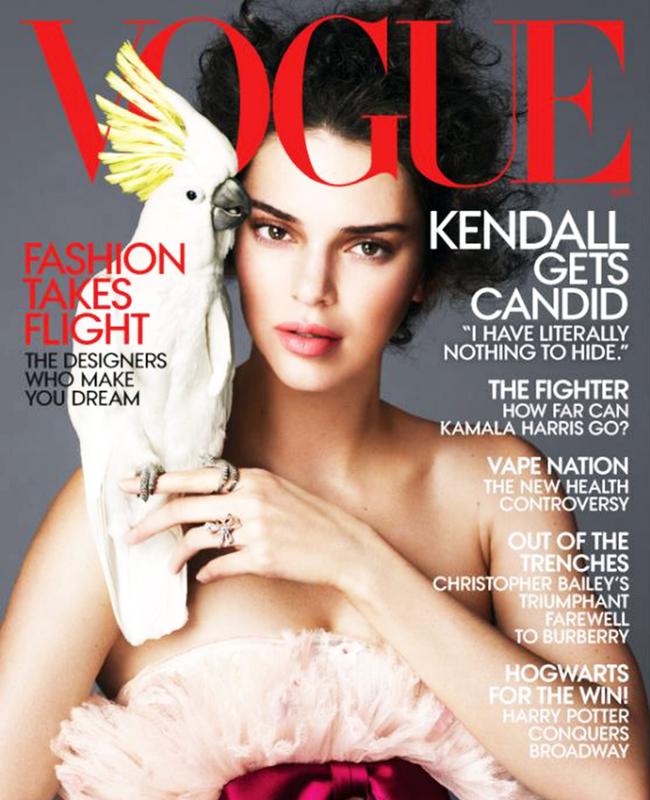 Kendall Jenner appears on the April 2018 issue of US Vogue with a cockatoo. Picture: Vogue