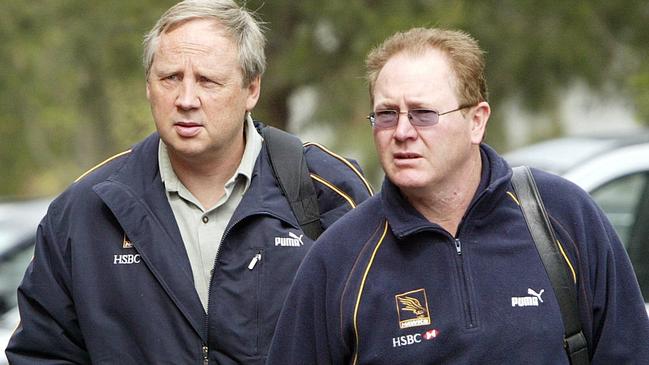 John Hook (left) was the Hawthorn recruiter who first approached Dunstall after a state game between Queensland and Tasmania.