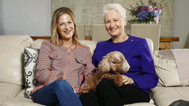 Jackie Stricker-Phelps and Dr Kerryn Phelps with their dog Lu-lu. Picture: John Appleyard