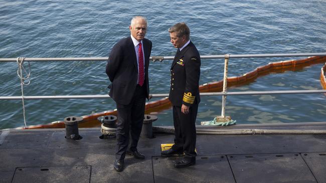 Australian Prime Minister Malcolm Turnbull stands with Vice Admiral Timothy Barrett at Adelaide’s ASC, after naming France as the winner of the subs build. Picture: AAP Image/Ben Macmahon