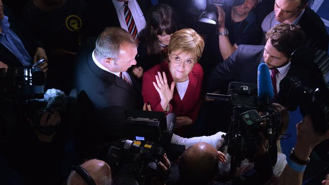 Nicola Sturgeon arrives at the counting hall in Glasgow yesterday.