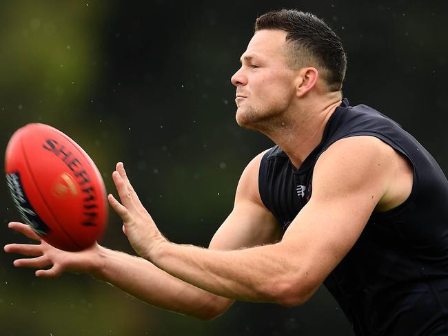 MELBOURNE, AUSTRALIA - DECEMBER 14: Steven May of the Demons marks during a Melbourne Demons AFL training session at Gosch's Paddock on December 14, 2018 in Melbourne, Australia. (Photo by Quinn Rooney/Getty Images)