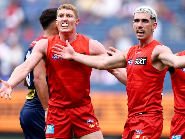 MELBOURNE, AUSTRALIA - MARCH 29: Matt Rowell and Sam Flanders of the Suns react during the round three AFL match between Melbourne Demons and Gold Coast Suns at Melbourne Cricket Ground, on March 29, 2025, in Melbourne, Australia. (Photo by Josh Chadwick/AFL Photos/via Getty Images)