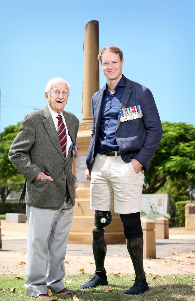 World War II veteran Stan Mellick, 102, with Afghanistan veteran Curtis McGrath. Picture: Steve Pohlner