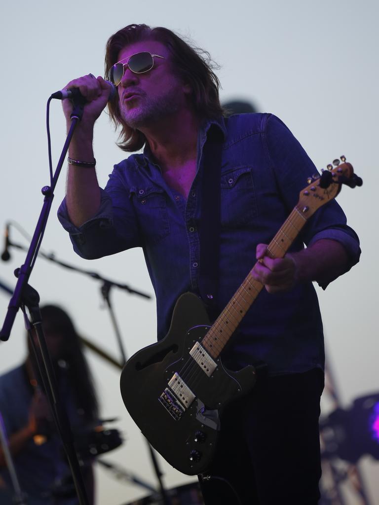 Tex Perkins entertains the crowd as thousands of Territorians gather at Mindil Beach to celebrate Territory Day. Picture: Glenn Campbell