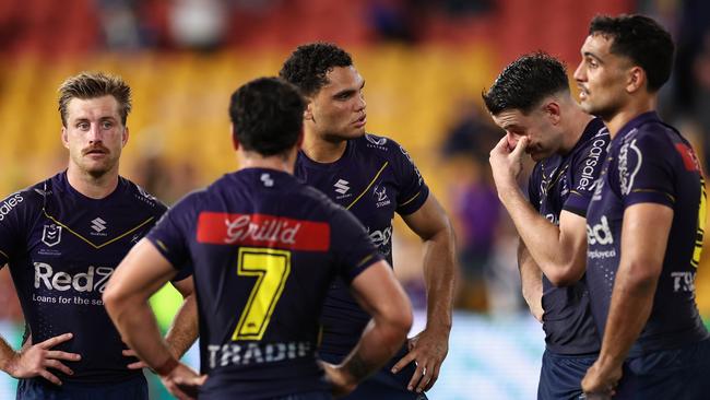 BRISBANE, AUSTRALIA - MAY 06: Storm players look dejected after losing the round 10 NRL match between Melbourne Storm and South Sydney Rabbitohs at Suncorp Stadium on May 06, 2023 in Brisbane, Australia. (Photo by Cameron Spencer/Getty Images)