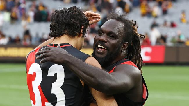 Alwyn Davey Jr and Anthony McDonald-Tipungwuti enjoy Essendon’s round 1 victory over Hawthorn.