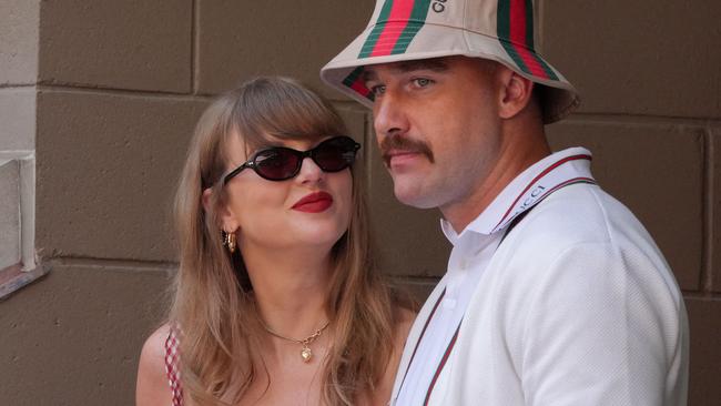 Taylor Swift, self-described childless cat lady, with her boyfriend, NFL player Travis Kelce. Picture: Timothy A. Clary/AFP