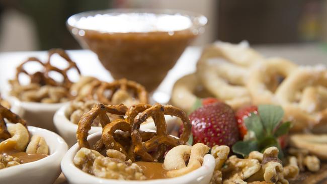 Dulce de leche can be served with salted pretzels and nuts or spread on pancakes or toast.