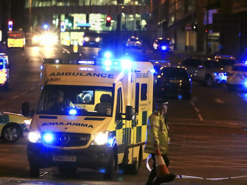 Emergency services work at Manchester Arena after reports of an explosion at the venue during an Ariana Grande concert. Picture: AP