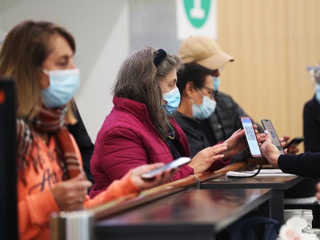 Arrivals to Hobart screened at Hobart Airport after Tasmania closed it's border with Victoria.  Picture: Nikki Davis-Jones