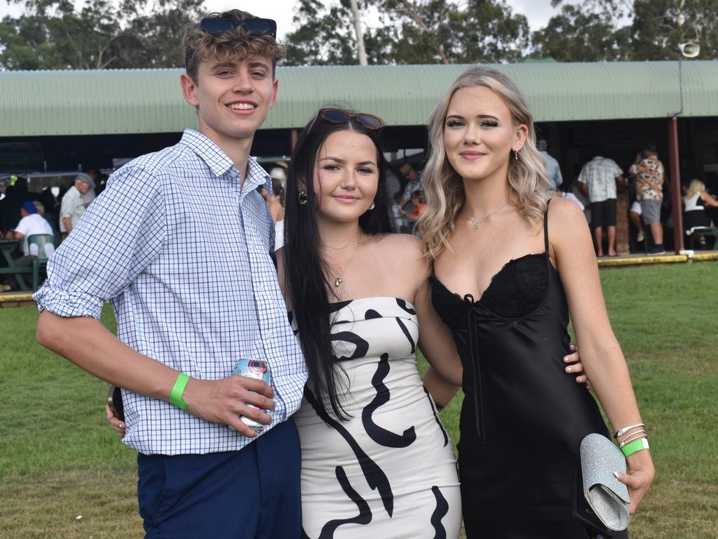 Samuel Bent, Shakira Austin and Grace North at the Yeppoon Turf Club's Derby Day races at Keppel Park Racecourse on November 2, 2024.