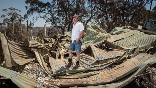 Enrico Sgarbi stands on the remains of his home on Croft Rd. Picture: Brad Fleet