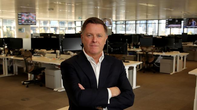 Mark Whelan, head of ANZ's institutional division, on the deserted trading floor of the bank's Melbourne office. Picture: Stuart McEvoy