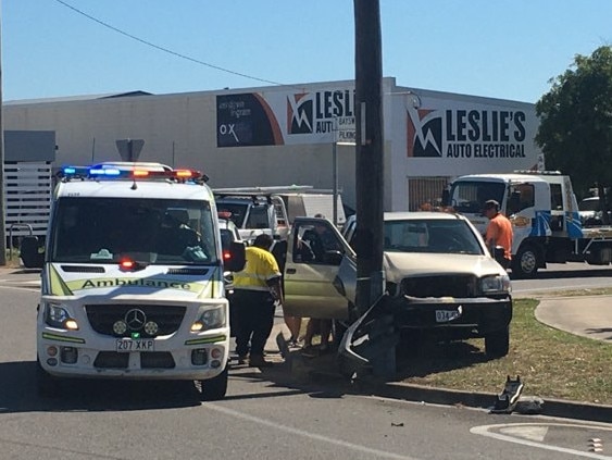 A man is being treated by paramedics after a crash at the corner of Pilkington St and Bayswater Rd. Picture: Evan Morgan